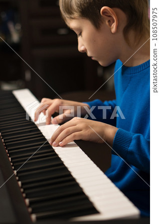Young Pianist at Practice Young Pianist at Practice 108507975
