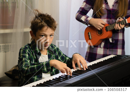 Focused Piano and Ukulele Practice Focused Piano and Ukulele Practice 108508317
