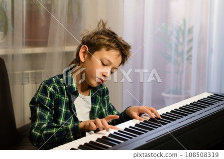 Focused Piano Practice Session Focused Piano Practice Session 108508319
