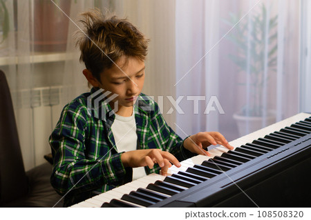 Focused Piano Practice Session Focused Piano Practice Session 108508320