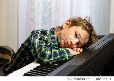 Tired Young Pianist Resting Tired Young Pianist Resting 108508321