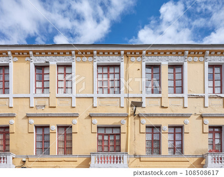 Street view of an old colonial building facade in Quito, Ecuador. 108508617