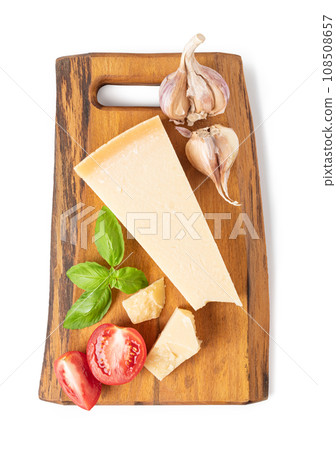 Parmesan cheese on a cutting board 108508657