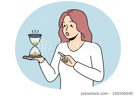 Shocked woman look at hourglass Shocked woman look at hourglass 108508890