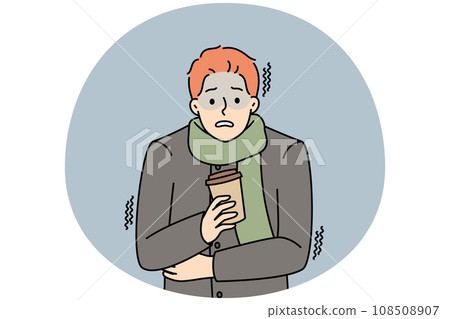 Unhappy man with coffee freezing outdoors 108508907