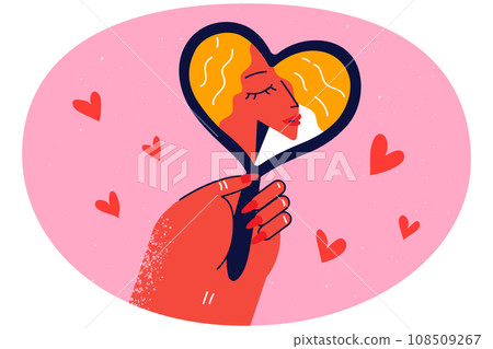 Woman look in heart-shaped mirror Woman look in heart-shaped mirror 108509267