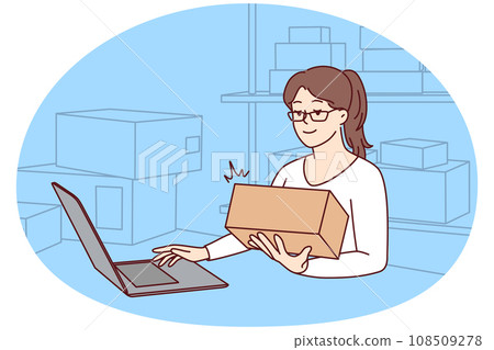 Woman working on laptop at warehouse 108509278