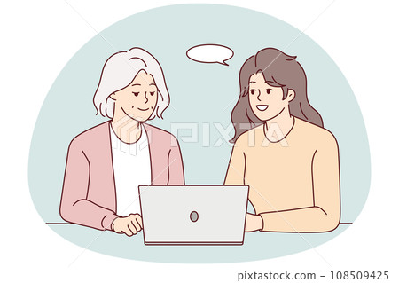 Smiling woman help mature mother with laptop 108509425