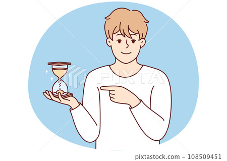 Smiling man point at sandglass 108509451