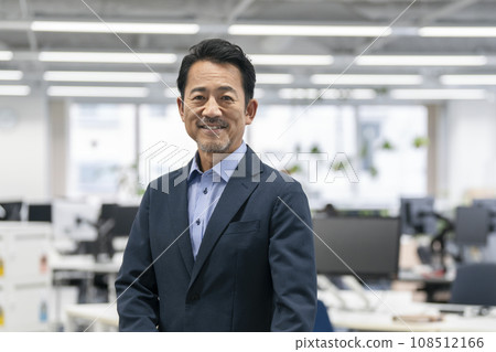 Portrait of a businessman in his 50s looking at the camera 108512166