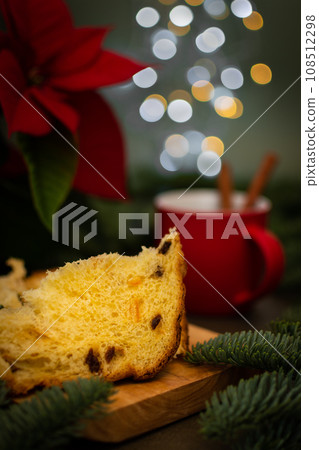 Christmas cake and red cup of tea Christmas cake and red cup of tea 108512298