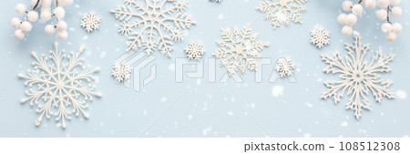 White snowflakes on a blue background 108512308