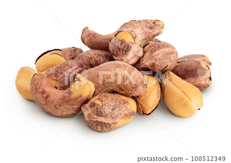cashew nuts heap with shell isolated on white background 108512349
