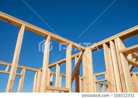 Abstract Perspective of a House Wood Construction Framing. 108512551