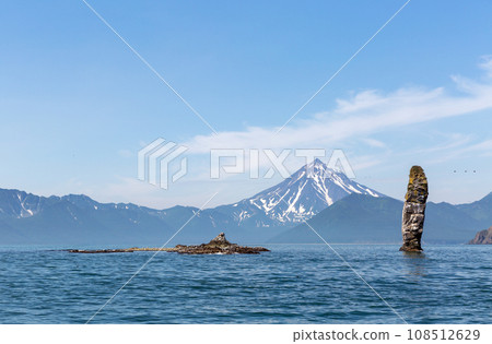 Stone cliff near Russkaya bay. Russia, Kamchatka. 108512629