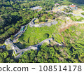 Nakijin, Okinawa in December: Panoramic view of the Nakijin Castle ruins (Nakijin Gusuku) and the sea 108514178