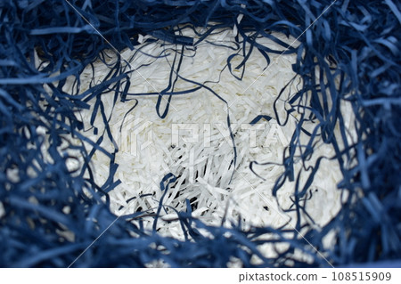 blue and white paper filler on carton cardboard box, texture background for design 108515909