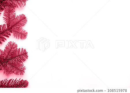 Viva Magenta - trendy color of the year 2023. Christmas flat lay of fir branches on the background with copy space. 108515978