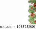 Christmas flat lay composition. Green branches with red berries and brown cones on white background. 108515980