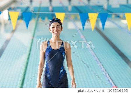 woman going to the pool woman going to the pool 108516395