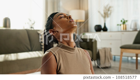 Yoga, breathing and woman stretching in home, living room with calm meditation in apartment. Holistic, exercise and girl in spiritual workout for zen mindfulness, wellness and mental health stress 108518577