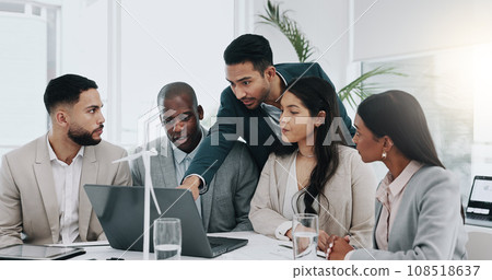 Business man, windmill and presentation in office with laptop, energy and sustainable future. Engineering consultant, leader and team for brainstorming, wind power and electricity on pc with speech 108518637