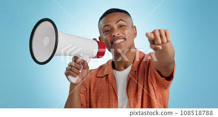 Man, megaphone and choice or pointing you for announcement, broadcast and vote or news on blue background. Portrait of person for join us, attention and voice with sale, bonus or winning in studio Man, megaphone and choice or pointing you for announcement, broadcast and vote or news on blue background. Portrait of person for join us, attention and voice with sale, bonus or winning in studio 108518788