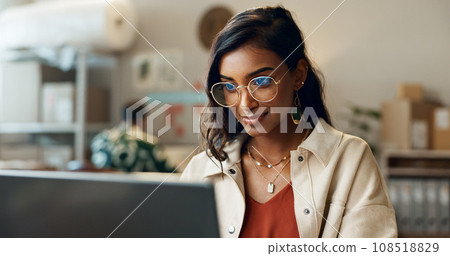 Woman, business and reading on laptop at work for research, feedback and supply chain for business. Indian, person and planning on pc for logistics, stock administration or package distribution data Woman, business and reading on laptop at work for research, feedback and supply chain for business. Indian, person and planning on pc for logistics, stock administration or package distribution data 108518829