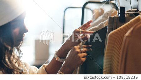 Designer, woman or choice on clothing rack in retail shop or small business for sample or collection. Creative stylist, customer and search or decision for design, fabric or fashion clothes in store 108519239