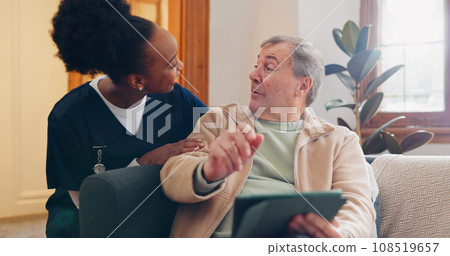 Tablet, nurse and senior man on sofa browsing on internet for medical consultation research. Bonding, healthcare and black woman caregiver talking to elderly patient networking on technology at home. Tablet, nurse and senior man on sofa browsing on internet for medical consultation research. Bonding, healthcare and black woman caregiver talking to elderly patient networking on technology at home. 108519657