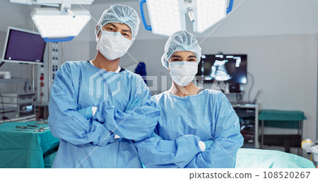 Team, doctor and arms crossed with mask of professional in ICU for surgery, healthcare or procedure at hospital. Medical surgeon people in confidence, expert or teamwork for emergency care at clinic 108520267