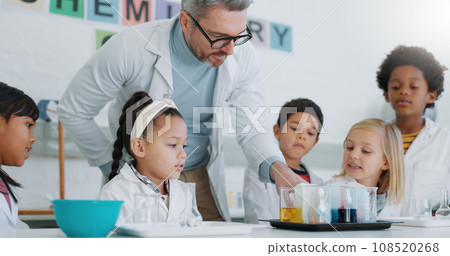 Chemistry, teacher and students with education, classroom and science with research, conversation and experiment. School, man and children with educator, laboratory or kids with support and questions 108520268
