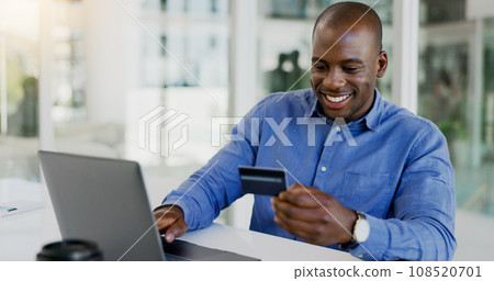 Business man, credit card and laptop for office online shopping, e commerce payment and happy loan. African employee on computer for web banking, financial investment or registration for debit order Business man, credit card and laptop for office online shopping, e commerce payment and happy loan. African employee on computer for web banking, financial investment or registration for debit order 108520701