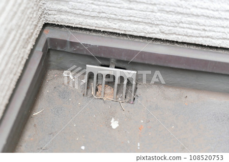 Garbage accumulated in the balcony drain Garbage accumulated in the balcony drain 108520753