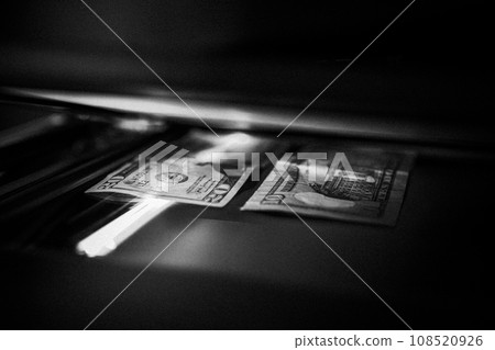 Using a copy machine to print forgery currency. Using a copy machine to print forgery currency. 108520926