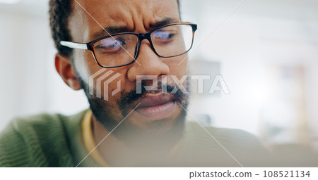 Man, thinking or confused at work laptop or idea, thoughts problem solving. Black person, glasses closeup or job email communication stress or plan doubt, research brainstorming or freelance fail 108521134