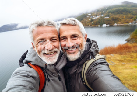 Two aged men travel and take selfies 108521706