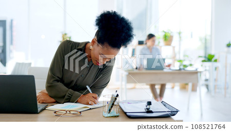 Business, office and black woman with a laptop, writing and connection with planning, website info and employee. African person, consultant and worker with a pc, email notification and brainstorming 108521764