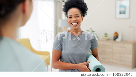 Friends, yoga and women speaking in home for wellness, healthy body and fitness. Personal trainer, living room and people in conversation with gym mat for pilates, exercise and mindfulness workout 108522043