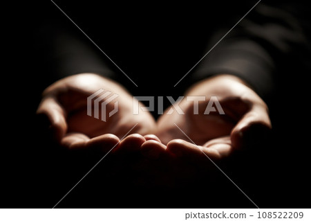 Hands, prayer and help from God with charity, closeup and praise with giving, gratitude and respect for religion. Search for guidance, wellness and praying, worship and faith with person and trust 108522209