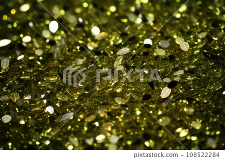 Green and olive sequins close-up 108522284