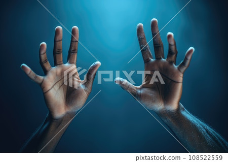 Two hands on a blue background 108522559