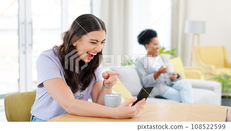 Phone, video call and young woman in the living room laughing in conversation at home. Smile, technology and happy female person on virtual discussion with cellphone by table in modern apartment. 108522599
