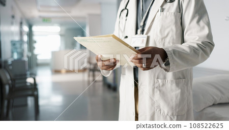 Hands, medical folder and doctor with results, person in hospital with signature, surgeon and healthcare document. Reading health report, sign off with paperwork and medicine, check info and chart 108522625