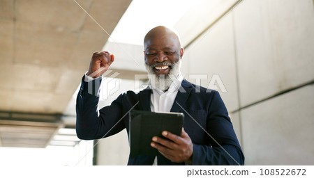 Tablet, celebration and senior businessman in the city with good news, job promotion or winning. Happy, digital technology and professional African male lawyer with fist pump for success in town. Tablet, celebration and senior businessman in the city with good news, job promotion or winning. Happy, digital technology and professional African male lawyer with fist pump for success in town. 108522672