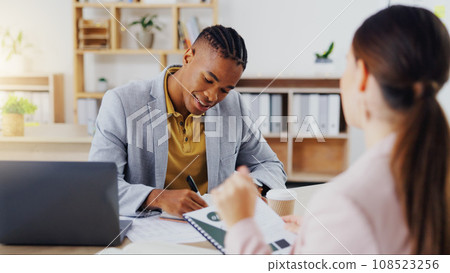 Startup, consultants and black man in office, conversation and new project, schedule and share ideas. Employees, female client and male worker explain process, system and planning with paperwork 108523256