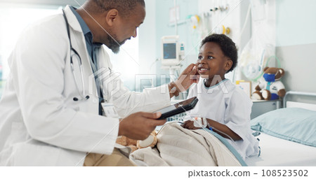 Doctor, African boy kid and hospital with tablet, smile and rest for recovery from surgery, treatment or inspection. Child patient, medic and check with touchscreen, talk and rehabilitation in clinic 108523502