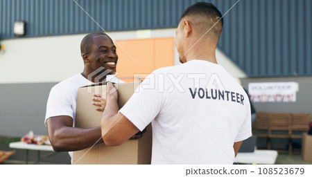 Volunteer men, helping and boxes for charity, food and clothes drive with community service for kindness. Teamwork, support and social responsibility for donation package, smile and care in workshop Volunteer men, helping and boxes for charity, food and clothes drive with community service for kindness. Teamwork, support and social responsibility for donation package, smile and care in workshop 108523679