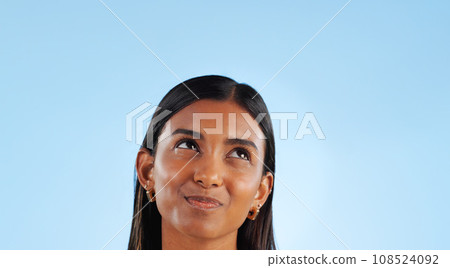 Woman, thinking in studio and ideas for inspiration and dream, future with mockup space on blue background. Question, decision and problem solving, solution with brainstorming and mindfulness Woman, thinking in studio and ideas for inspiration and dream, future with mockup space on blue background. Question, decision and problem solving, solution with brainstorming and mindfulness 108524092