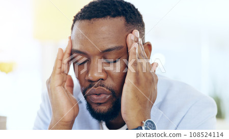 Black man, headache and business stress from mistake, debt or financial crisis in burnout at office. Frustrated African businessman or employee in pain, anxiety or depression for fail at workplace 108524114